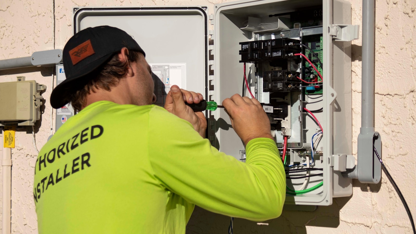 Air conditioning technician working on an outdoor unit